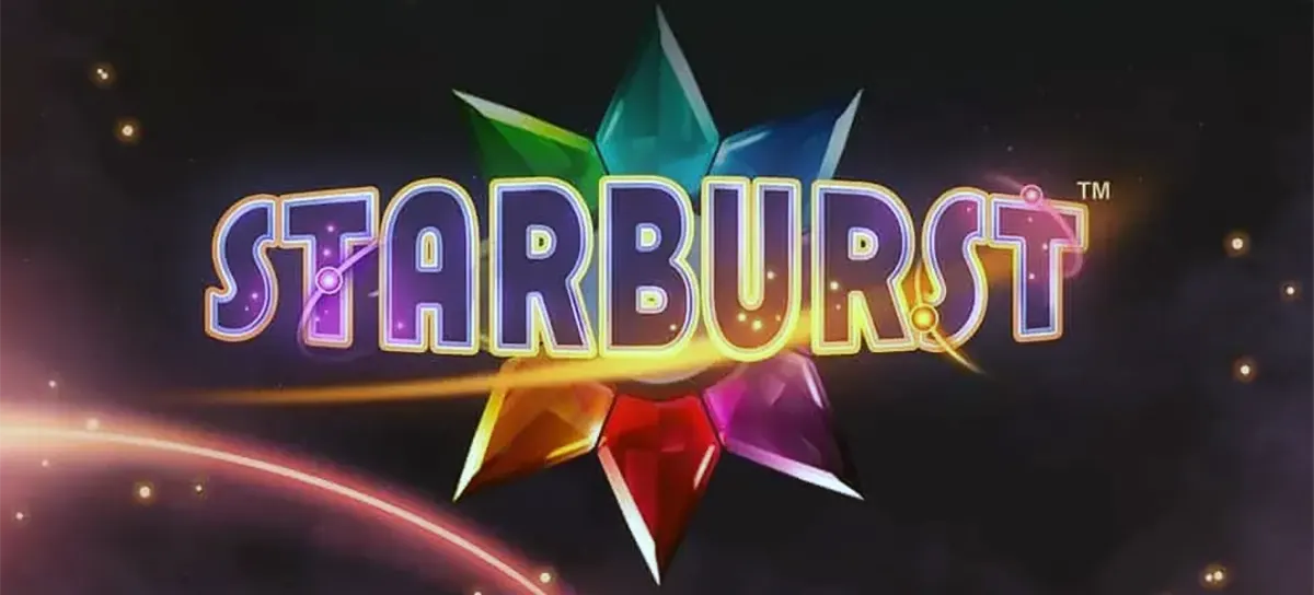 Starburst slot title screen showing the glowing “STARBURST” logo over a dark space background with colourful faceted gemstones and light streaks.